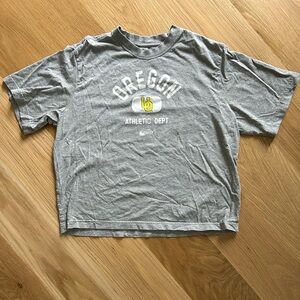 NIKE University of Oregon Athletic Dept. Oversized Crewneck Cropped The NikeTee